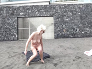 Masturbating on crowded beach