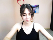 lili_magic sticking out tongue, standing and turning.