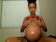 ariana aimes oiling pregnant belly and cumming