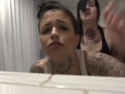 Tattooed Lesbians fuck with Strap on