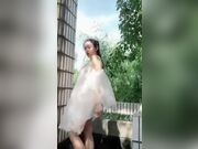 Chinese girl flashing in cute dress in public