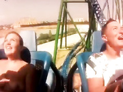 Titties popping out during a roller coaster ride