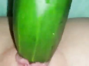 cucumber enlarges her ass