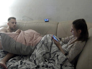 Esenia and Dima have sex on sofa