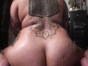 tattoed girl rides dildo