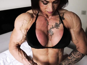 Paloma the most vascular woman on Earth flexes in bed