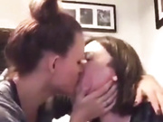 Mother and daughter kiss