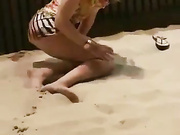 horny teen masturbating on a public beach